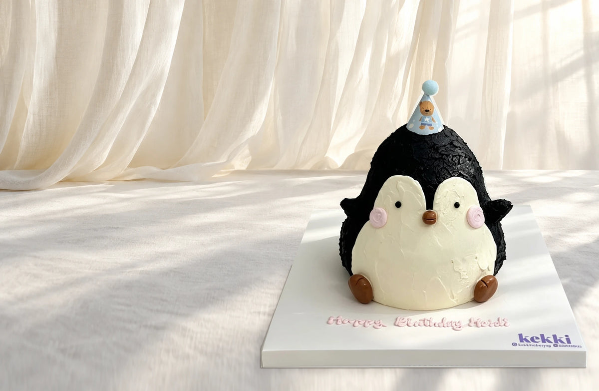 Kekki penguin custom cake